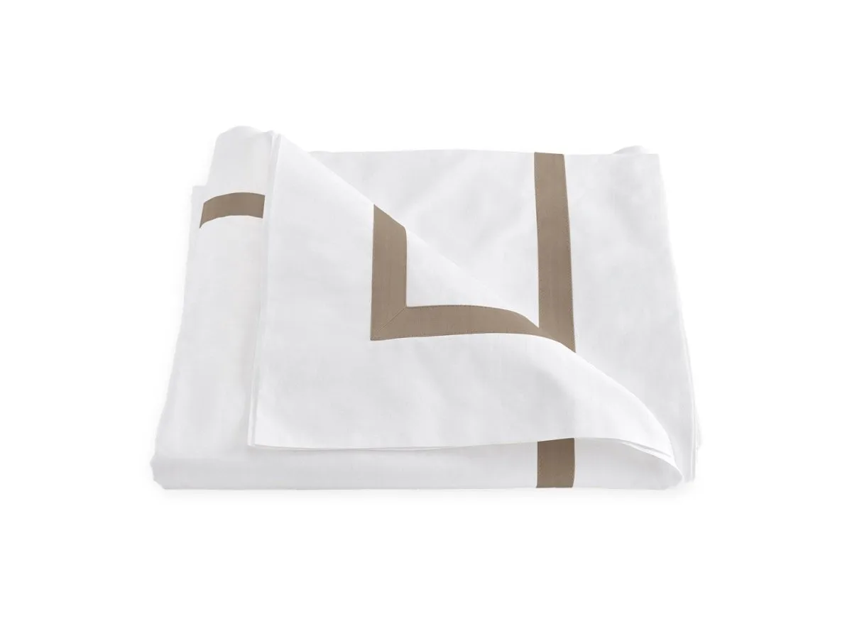 Lowell Khaki on White Bedding by Matouk